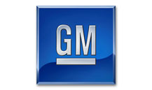 General Motors GM logo representing automotive brand partnerships with Secure Fit Accessories.